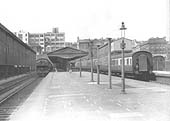 View of Moor Street station with an unknown GWR 2-6-2T 'Prairie' tank running bunker first at the head of a local passenger service