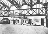 View of the concourse area leading to the platforms at Moor Street station showing the ground level goods yard to the right of the release road for locomotives