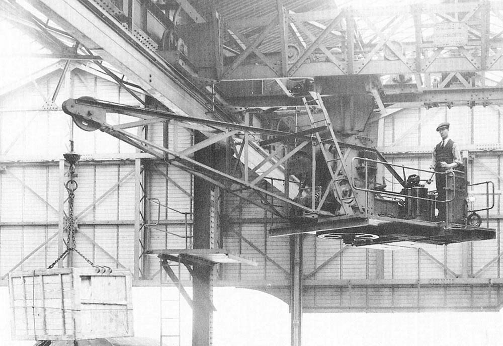 Close up of the the traversing carriage slung under the beam and the 16 feet long jib crane demonstrating how it could lift loads of up to one ton