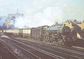 Ex-GWR 4-6-0 King class No 6026 'King John' is seen at the head of the up Cambrian Express as it leaves Snow Hill tunnel by Moor Street station in 1959