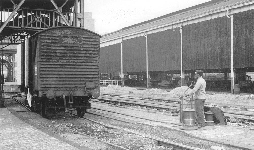 The Shunter draws out  the Banana Van out of the wagon hoist above Shed B using a rope and capstan