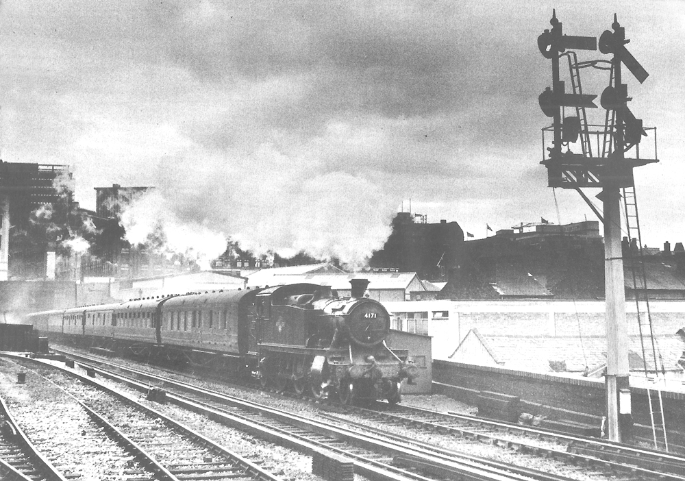 British Railways 2-6-2T 5101 class large prairie No 4171 leaves Snow Hill tunnel on the up main line descending past Moor Street Station on the left