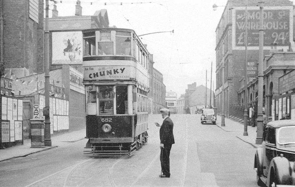 View along Moor Street as one of Birmingham's Trams passes the front of Moor Street station prior to their withdrawal