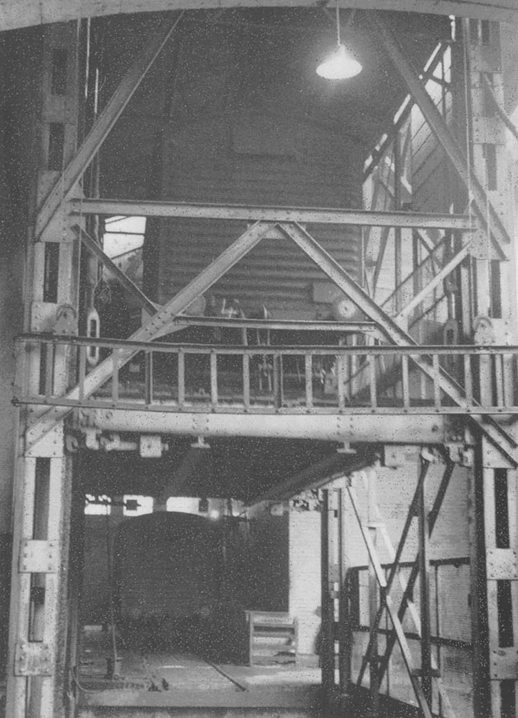 The covered wagon is lowered by the electrically powered hoist into Moor Street's underground shed