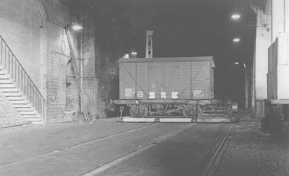 A shock absorber covered wagon being moved on the four rail, thirty ton traverser in low level shed B