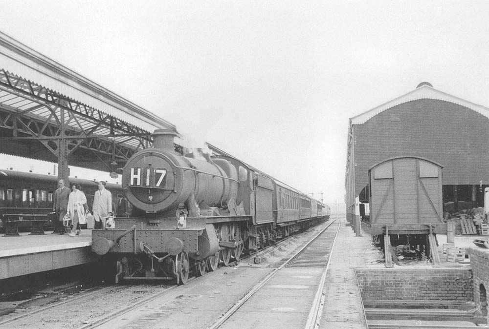 Ex-GWR 4-6-0 No 5946 'Marwell Hall' stands at Platform 3 after arriving with the 9:10am Kingswear to Moor Street service