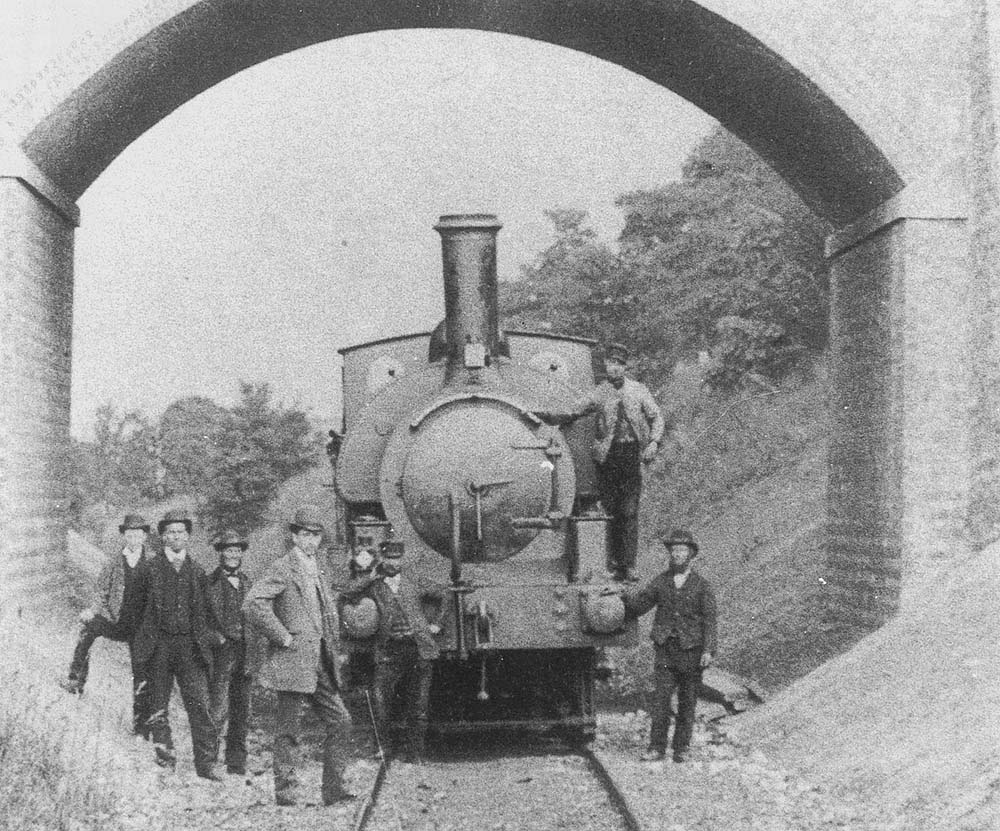 View  showing an unidentified GWR 0-6-0ST posed under 'New Bridge' Camden Road after the completion of the works to the bridge and cutting