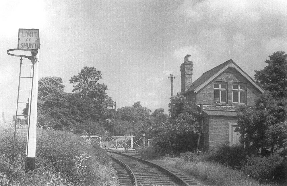 View of Todenham Road Level Crossing with the gate keeper's house standing on the right