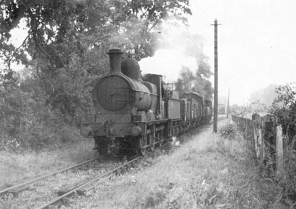 GWR 0-6-0 'Dean Goods' No 2551 approaches the Moreton to Todenham Roadd level crossing 4 September 1948
