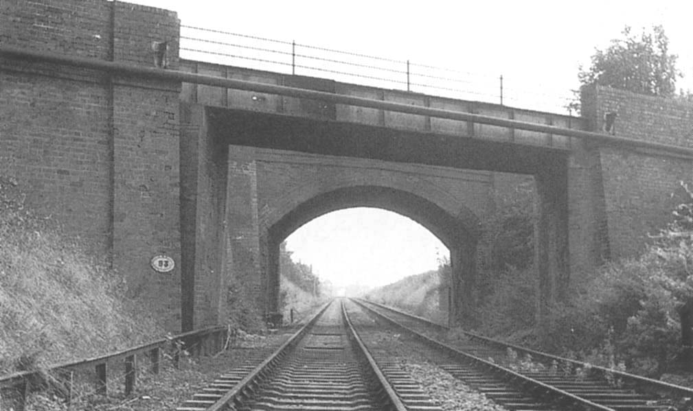 This view looking towards Blisworth in 1966 shows the two bridges at Clifford Sidings after the SMJR Clifford - Stratford section had been doubled in 1942