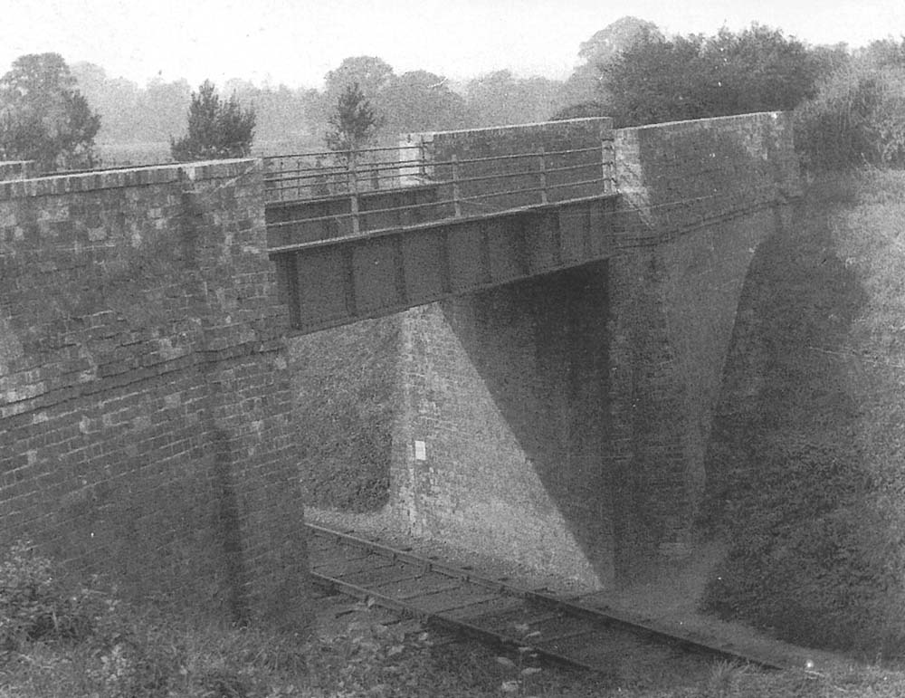 The tramway bridge over the former East & West Junction line (later SMJR), photographed from the adjacent road overbridge at Clifford Chambers on 30th September 1921