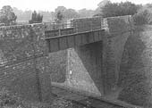 The tramway bridge over the former East & West Junction line (later SMJR), photographed from the adjacent road overbridge at Clifford Chambers on 30th September 1921