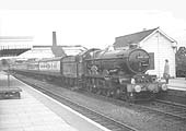 GWR 4-6-0 No 4088 'Dartmouth Castle' passing through the station on an up Worcester to Paddington express