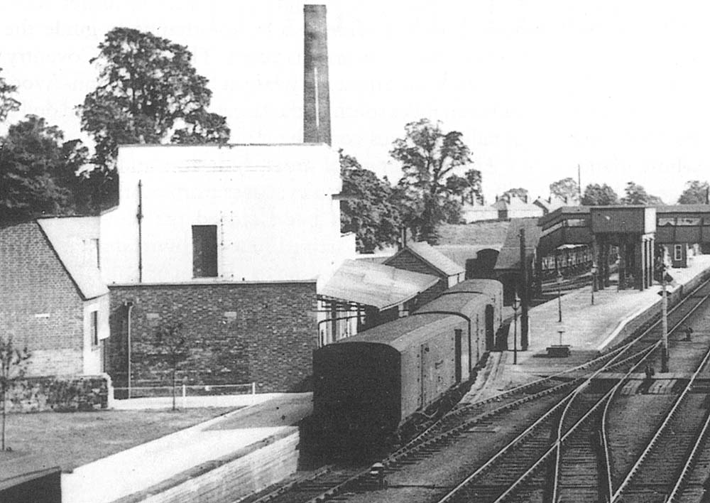 Close up of three empty Great Western Railway Siphons standing in Moreton-in-Marsh's creamery