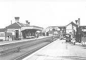 A 1930s view looking across from the up platform to the station's main brick built building on the down platform
