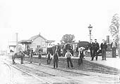 Station staff, shunting horse and the PW gang with the branch train standing in the background