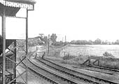View of the branch line taken from the platform with Todenham Road level crossing keeper's house in distance