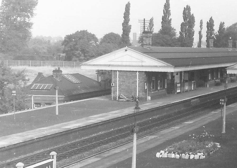 Close up showing the relief island platform and the rear of the booking office situated at road level