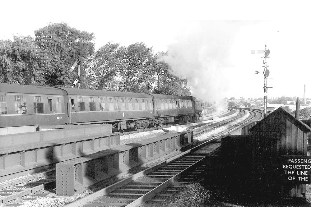 Ex-Great Western Railway 2-6-2T 5101 class No 4158 crosses the Ulverley Green Road plate girder bridge as it leaves the Relief Down platform