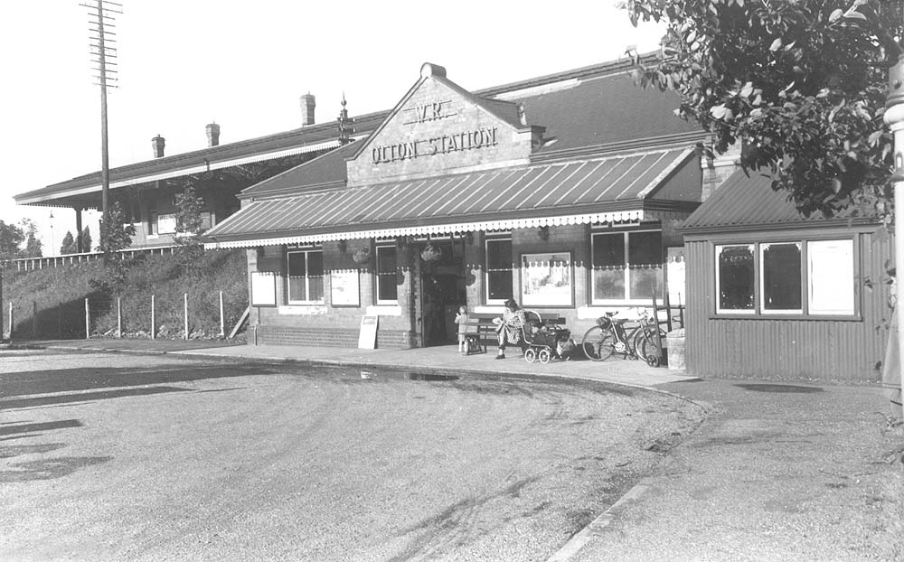 A 1950s view of the exterior view of Olton's 1930s rebuilt station showing the booking office and the new approach 'Station Drive'