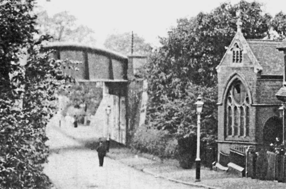 Brunel's bowed balloon-top wrought iron plate girder bridge crossing the Warwick to Birmingham turnpike road
