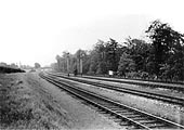 A view of the completed quadrupled track alongside Olton Mere looking towards Solihull near milepost 123�