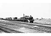 Ex-GWR 2-6-0 No 5332 is passing through Honeybourne North Junction with a Class H working in the late 1950s