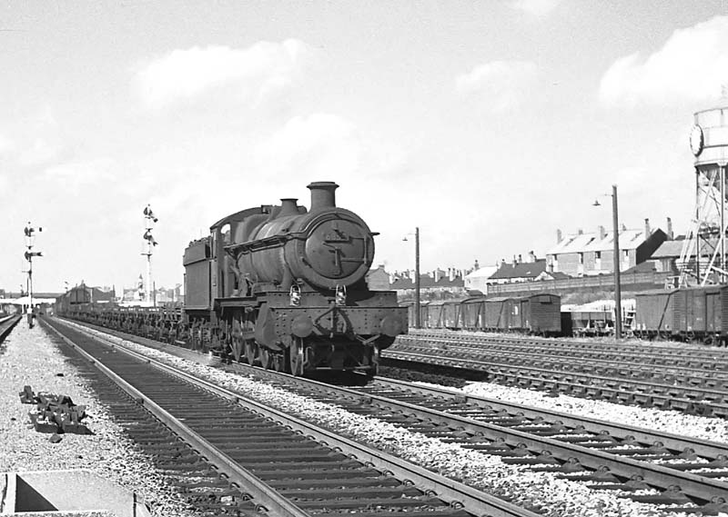 Ex-GWR 68xx Class 4-6-0 No 6855 'Saighton Grange' runs through Queens Head sidings on an up freight on 26th September 1964