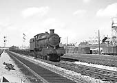 Ex-GWR 68xx Class 4-6-0 No 6855 'Saighton Grange' runs through Queens Head sidings on an up freight on 26th September 1964