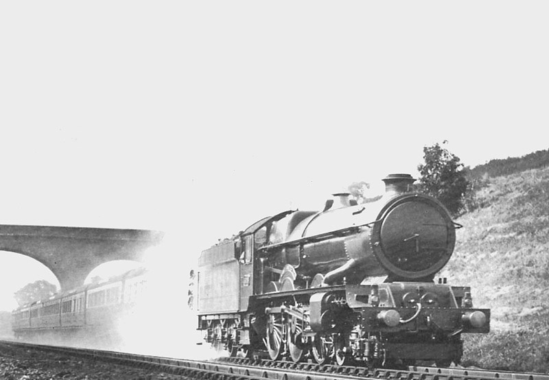 GWR 4-6-0 King class No 6003 'King George IV' picks up water whilst at the head of the down Paddington to Birkenhead service