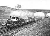 GWR 0-6-0 322 class locomotive No 354 heads a northbound local freight train over the Rowington troughs circa 1925