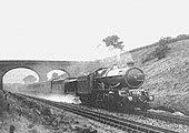 Great Western Railway 60xx (King) class 4-6-0 No 6000 �King George V� scoops up water from the troughs