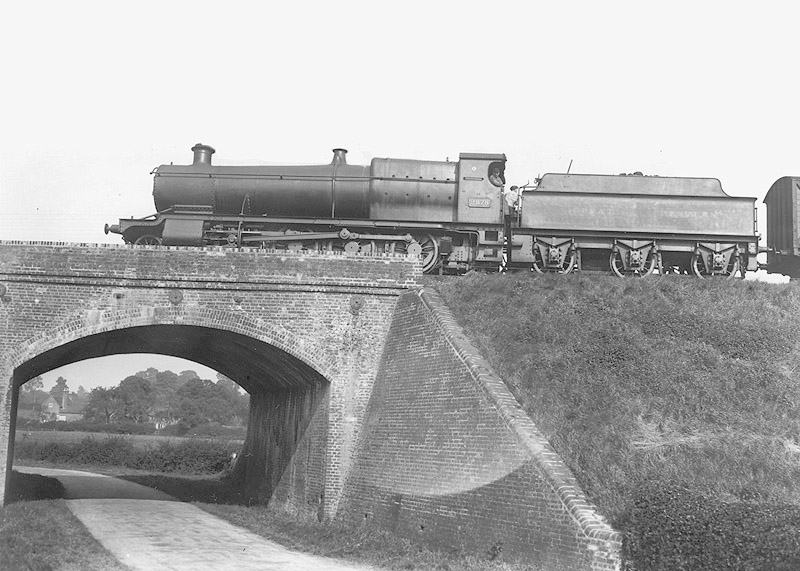 GWR 2-8-0 28xx class No 2878 is seen working hard near Rowington Junction as it climbs towards Birmingham Snow Hill