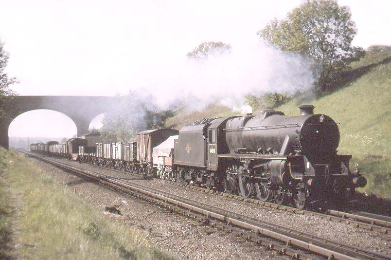 Ex-LMS 4-6-0 No 44810 on a Class F working whilst picking up water at Rowington Troughs
