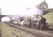 Ex-LMS 4-6-0 No 44810 is seen on a Class F working whilst picking up water at Rowington Troughs
