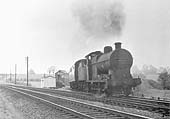 Ex-LMS 0-6-0 Class 4F No 44219 is seen departing the former branch line at Rowington Junction