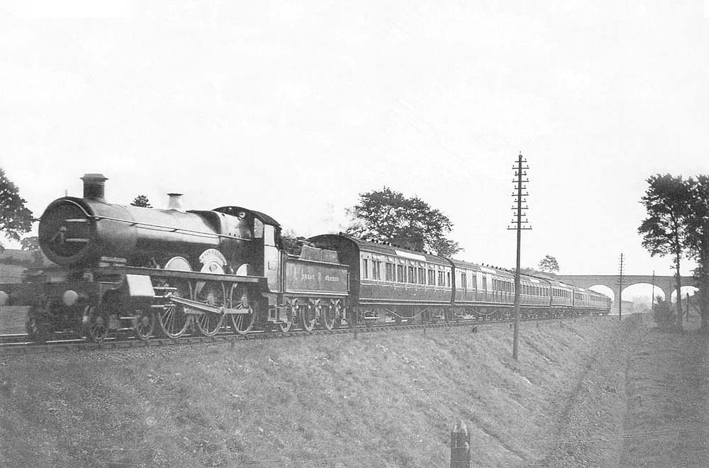 GWR 4-6-0 No 2924 'St Helena' is seen approaching Rowington Junction with an express service having passed over Rowington Troughs circa 1910