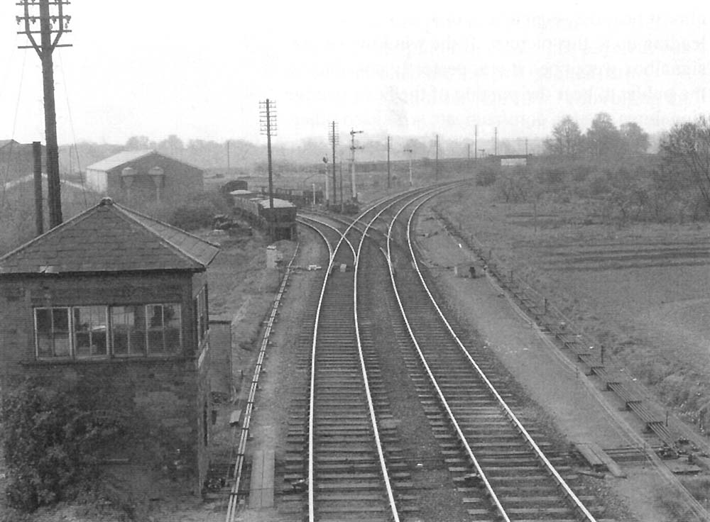 Looking south from Sanctus Street bridge with the signal box controlling access to the junction with the SMJ seen on the left in 1957