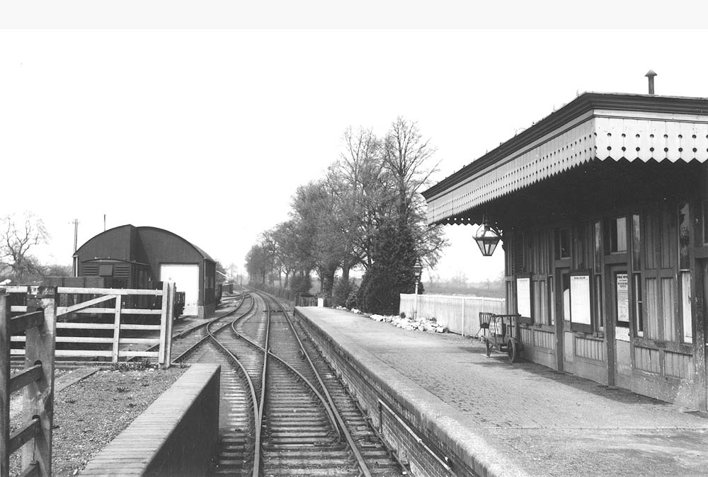 Another view looking down the line towards Moreton-in-Marsh with the station on the right and the goods shed on the left