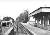 Another view looking down the line towards Moreton-in-Marsh with the station on the right and the goods shed on the left