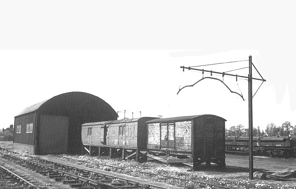View of the goods shed and extra storage facilities provided by the addition of two grounded bodies which have been raised clear of the ground