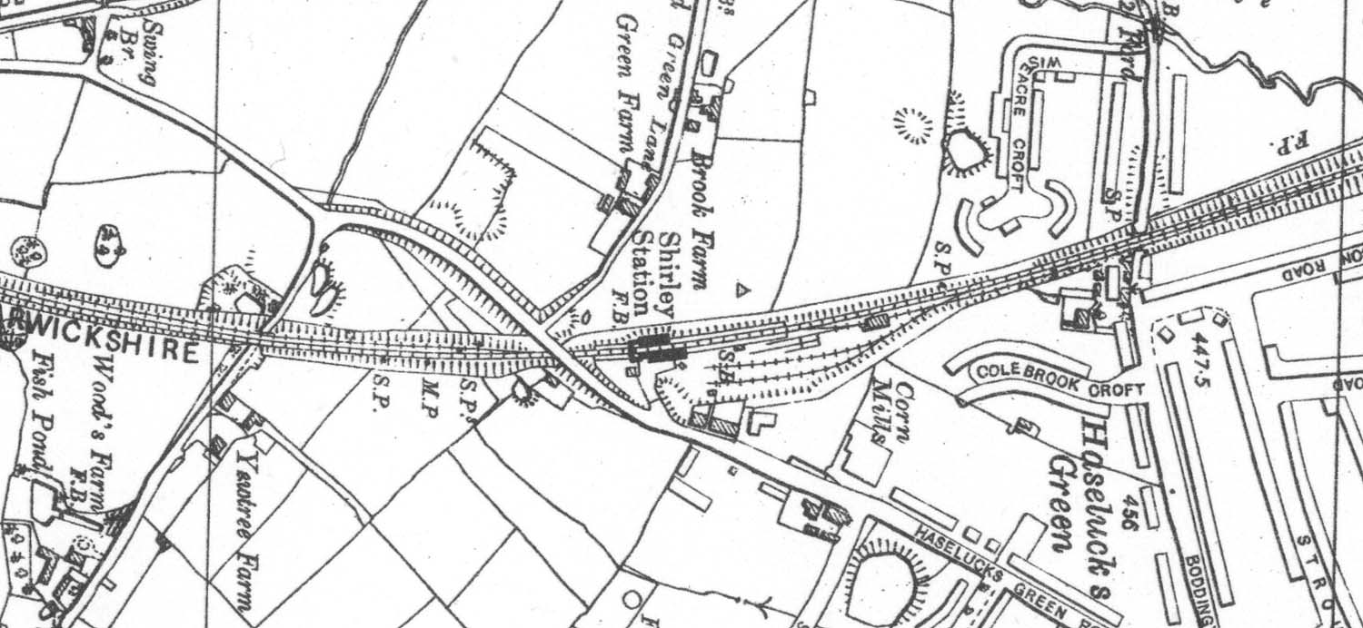 A 1938 Ordnance Survey Map showing Shirley Station, the goods yard and shed and the refuge sidings on each line