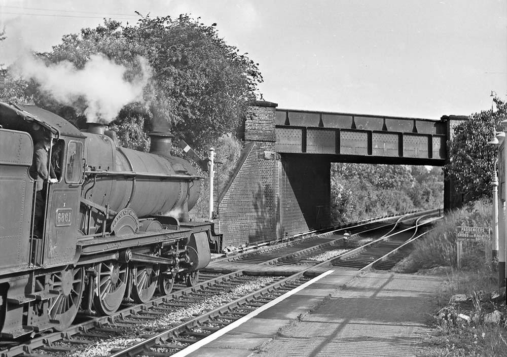 Ex-GWR 68xx Class No 6861 'Crynant Grange'  passes through Shirley on a down express service on 20th June 1964