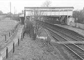 Looking towards Birmingham from Haslucks Green Road bridge with the up platform and passenger building beyond the footbridge on the left