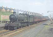Ex-GWR 4-6-0 No 6856 'Stowe Grange' is seen passing through the up main platform at the head of an empty stock working from Tyseley