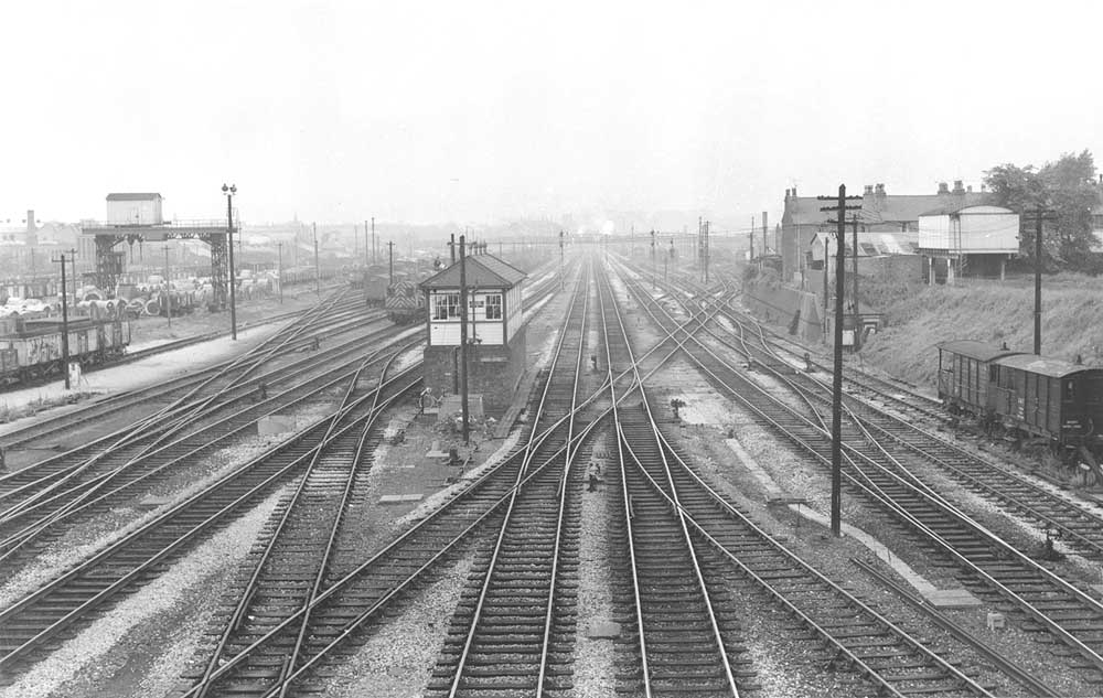 Looking North towards Bordesley on 18th July 1963 with Small Heath North Signal Box in the centre with the down and up relief lines passing on either side