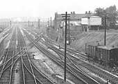 Close up showing the the throat to Small Heath & Sparkbrook station's up goods yard whilst on the right is the standard GWR water tank
