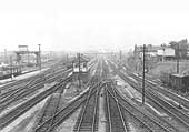 Looking in the direction of Birmingham with the main and relief lines to be seen on the left and a wartime 'Anderson' shelter in the garden