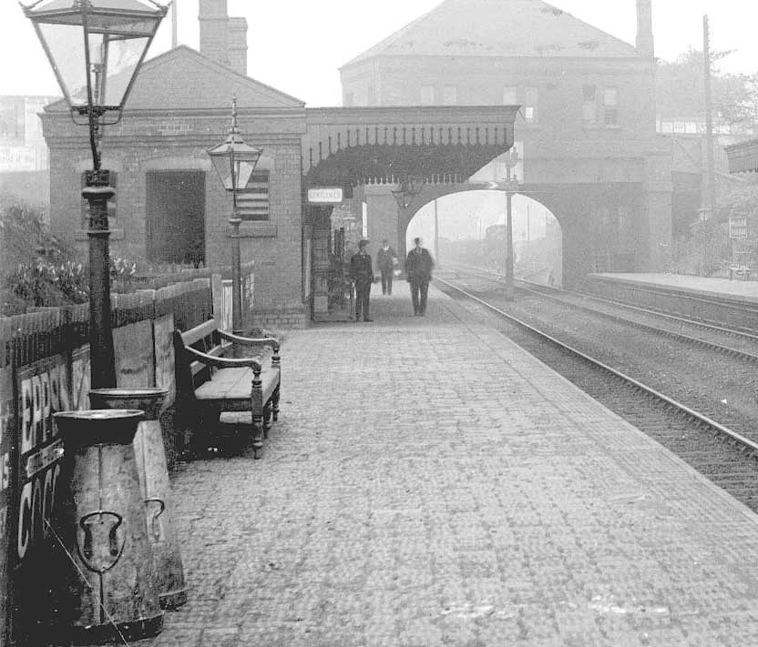 Close up of the down platform, the booking office erected on the overbridge and on the left the down platform's brick built passenger facilities