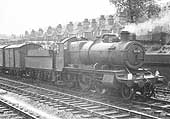 Ex-GWR 2-6-0 43xx class No 5386 at the head of a freight service pauses awaiting the all clear to proceed to one of Small Heath's goods sidings
